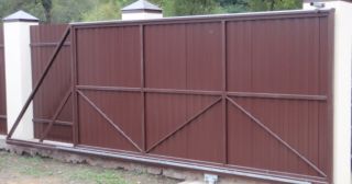 Купить откатные ворота из профнастила Мончегорск, цена от 1784 руб.