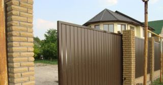 Купить откатные ворота из профнастила Мончегорск, цена от 1784 руб.
